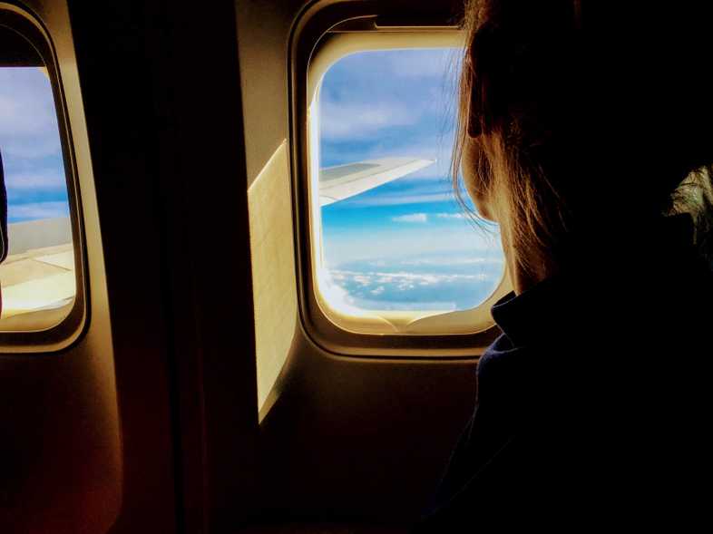 Sleeping on the plane - window seats often have a little extra space